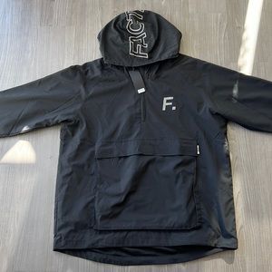 Fact. Brand 1/4 Zip Pullover with Pouch in Black. Brand New with Tags.